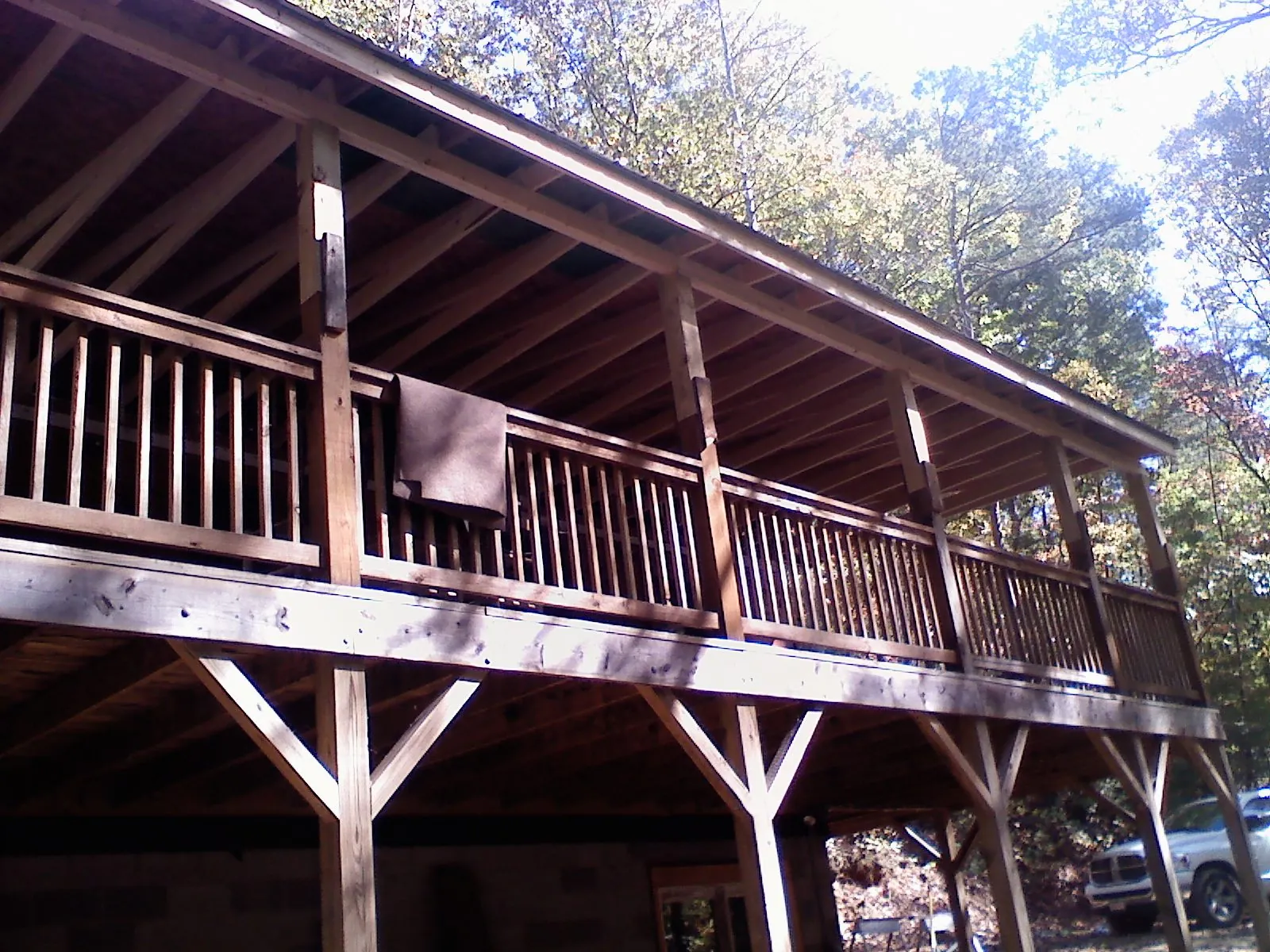 Timber framing under a new elevated porch and deck — Roof Leak Repair in Helenwood by Roofing Brothers